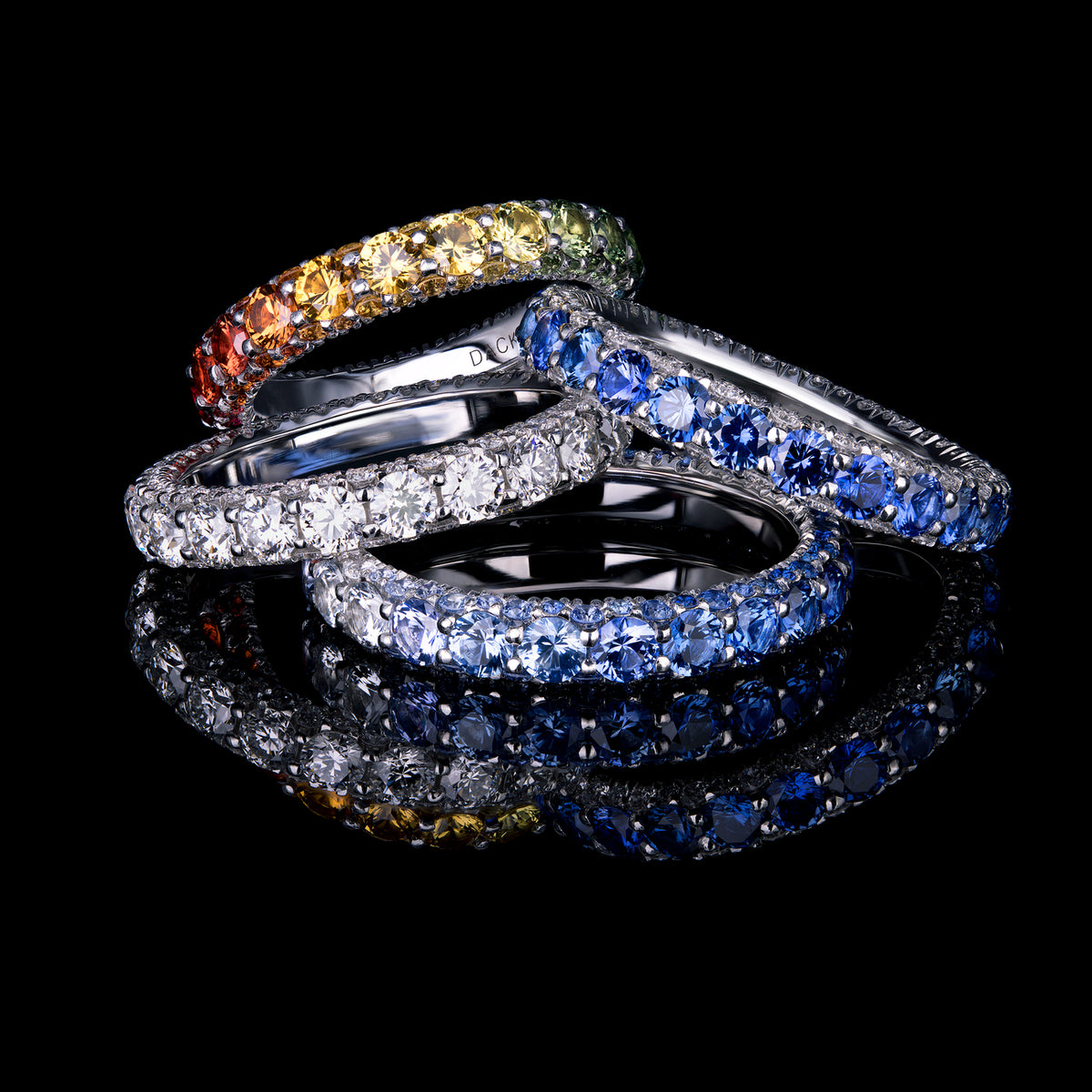 Stack of four eternity three-sided rings