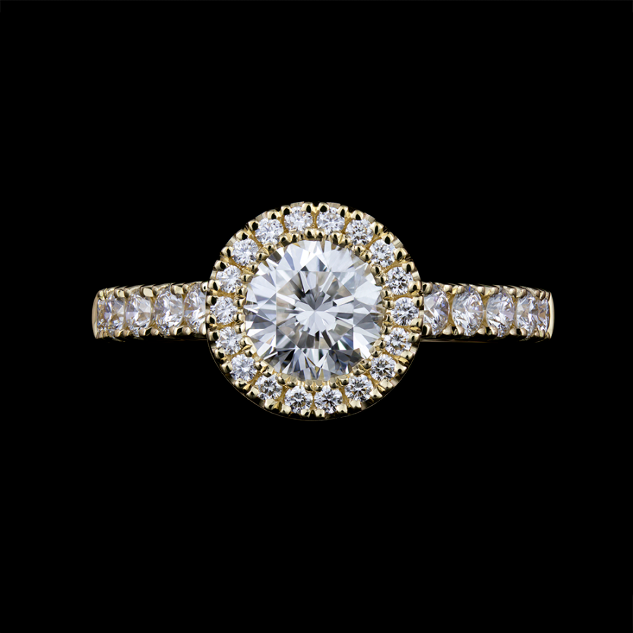 Clawless halo engagement ring on yellow gold
