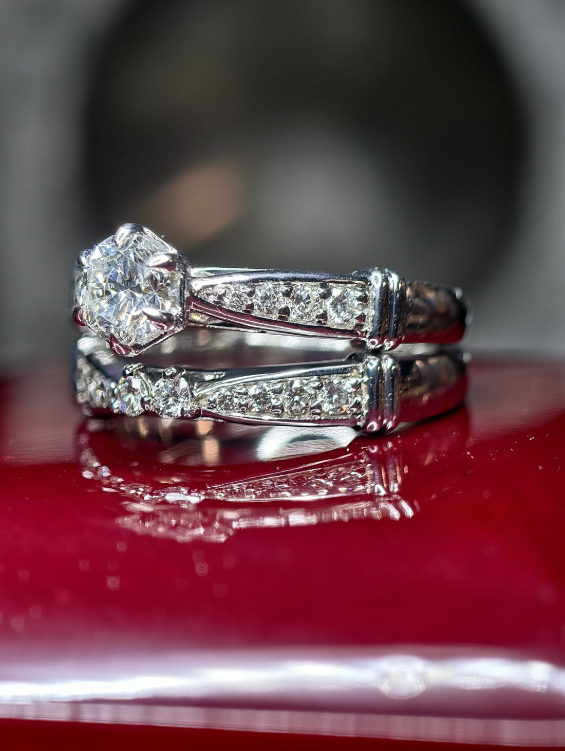 Student 6-prong center stone ring with tapered side stones in white-gold