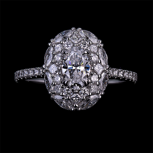 0.50 CT Oval diamond center stone set in 4 talon claws. Surrounded by a double halo with round, princess and marquise cut diamonds in a tight cluster setting. This piece is made in a platinum mount.