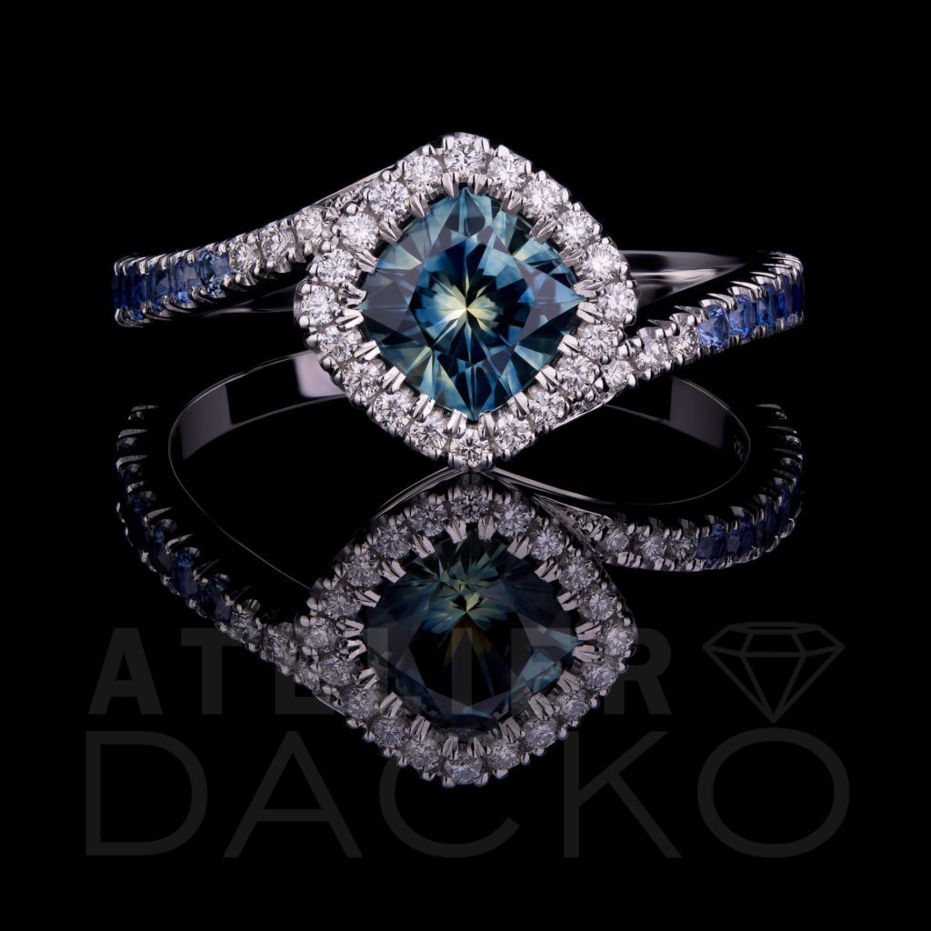 Front Facing 0.95 CT Blue Sapphire Clawless Halo Ring with a Gradient Band