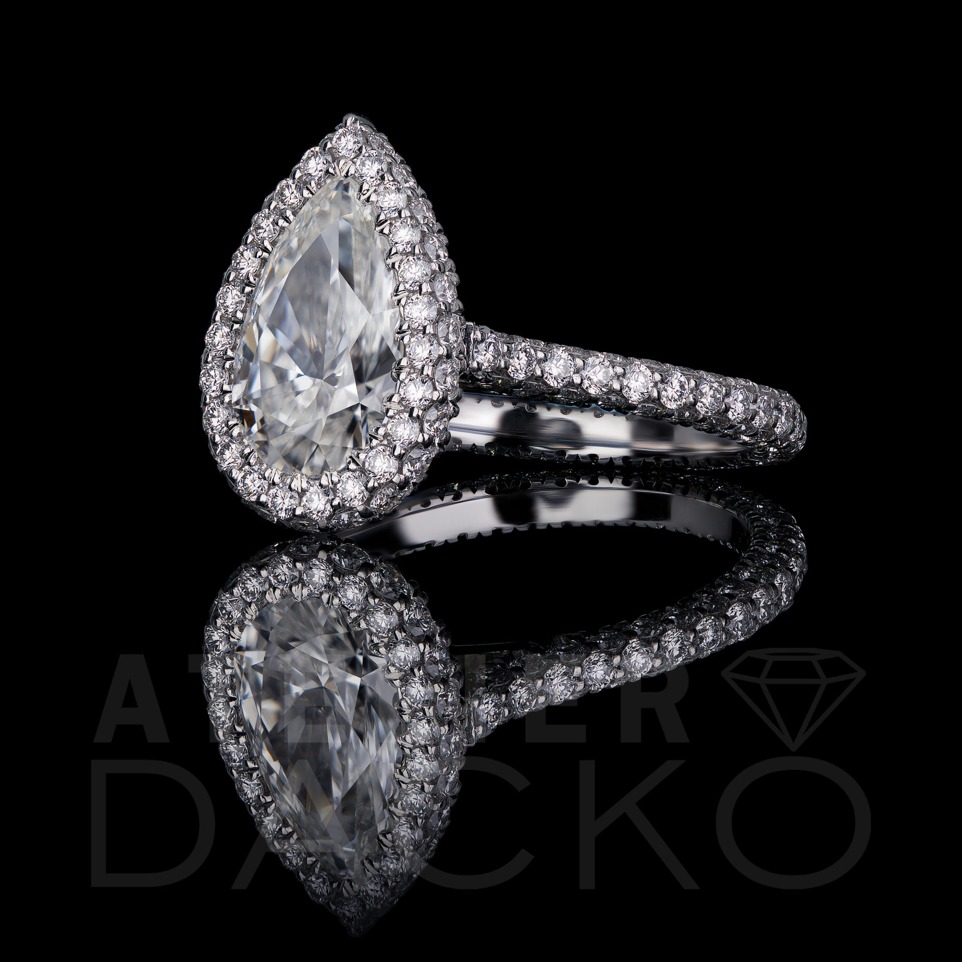 Side Facing 1.20 CT Pear Shaped Diamond Engagement Ring in Halo Setting