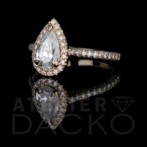 Side Facing 1.00 CT Pear Shape Diamond Engagement Ring with 3 Sided Shank