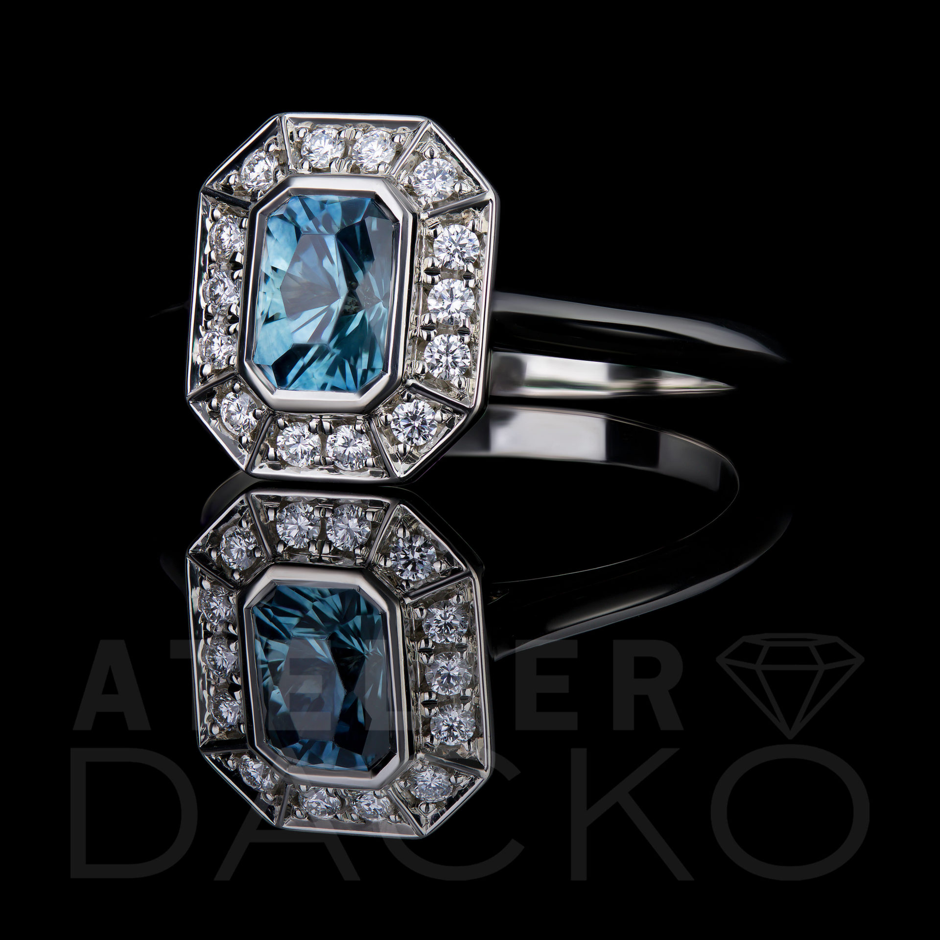 Side Facing 0.90 CT Emerald Cut Icy Blue Montana Sapphire with Vintage Halo