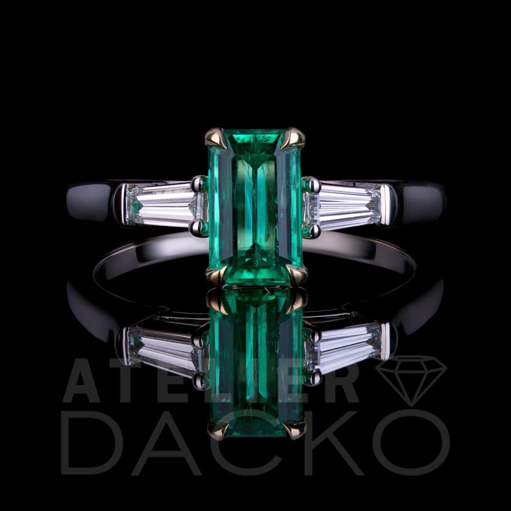 Front Facing 1.05 CT Emerald in Three Stone Ring Setting
