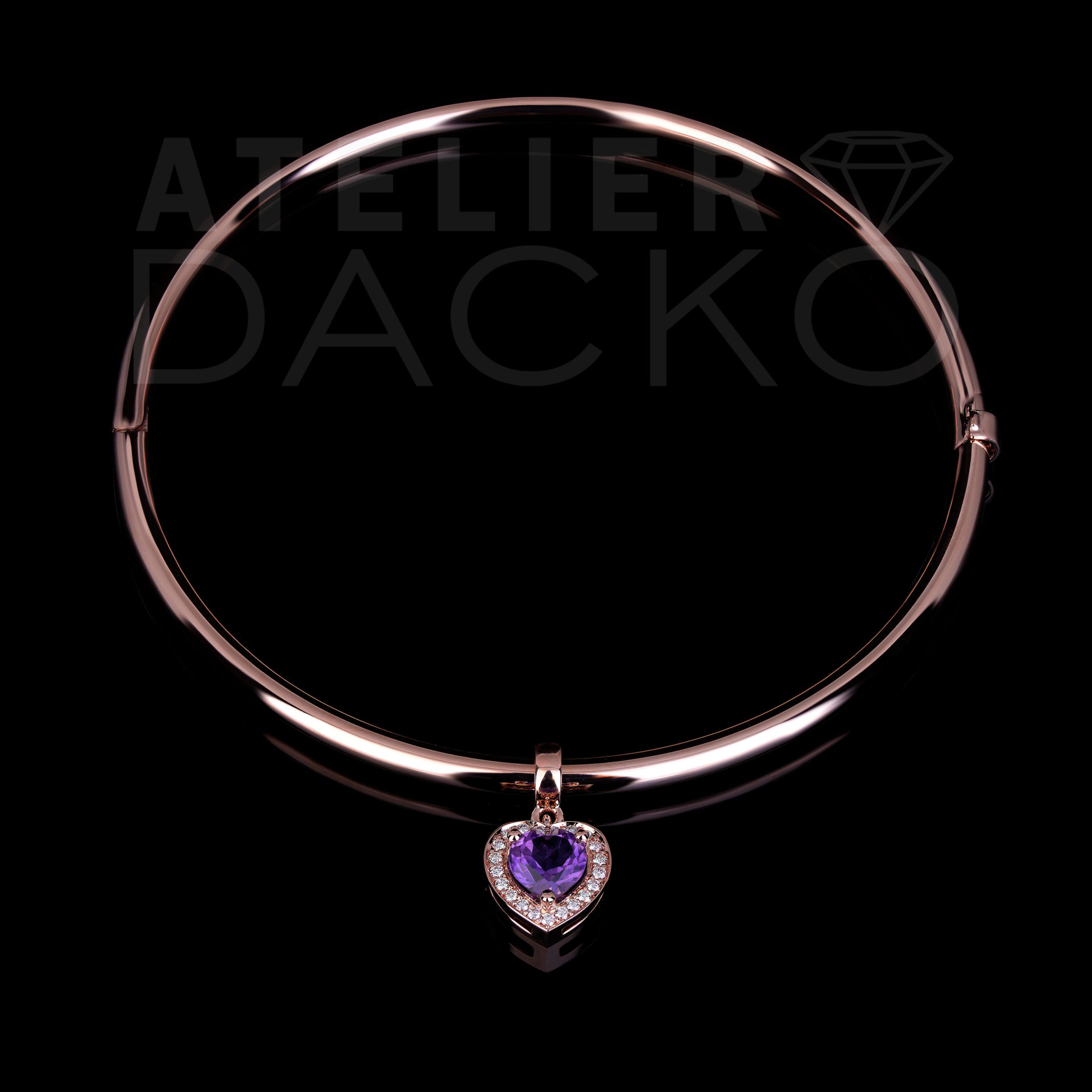 Rose gold bangle bracelet with heart shaped amethyst charm