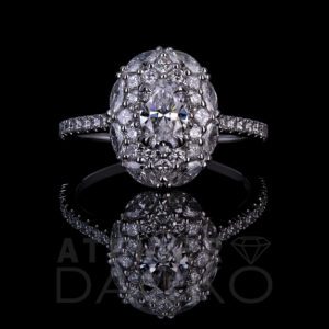 Front Facing 0.50CT Oval Diamond Engagement Ring with Mixed Cluster Diamond Halo