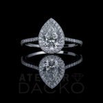Front Facing 1.60 CT Pear Cut Diamond Engagement Ring in a Clawless Halo Setting